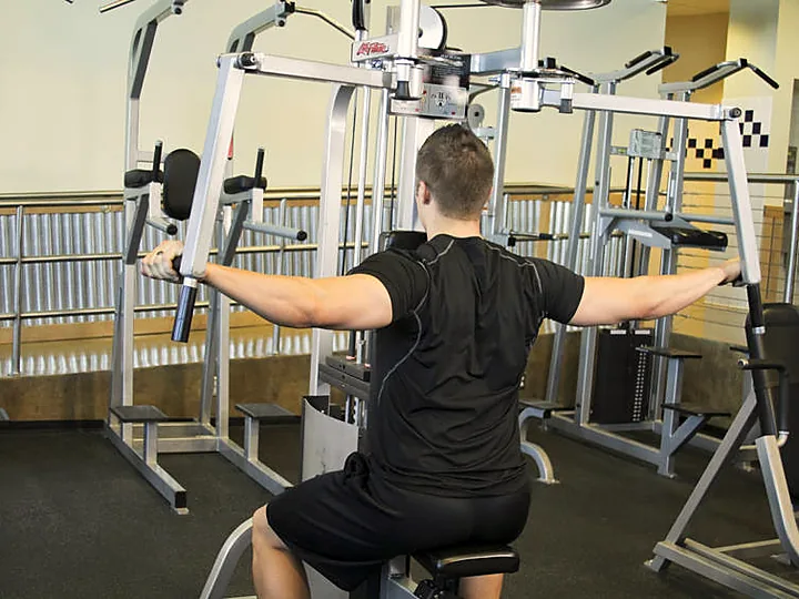 Reverse Pec Deck Fly: end position