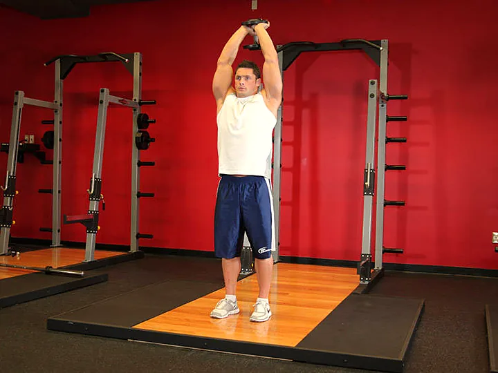 Standing Overhead Dumbbell Extension: starting position